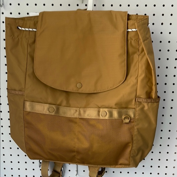 Madewell Handbags - Madewell Tan Canvas Backpack with Flap Closure